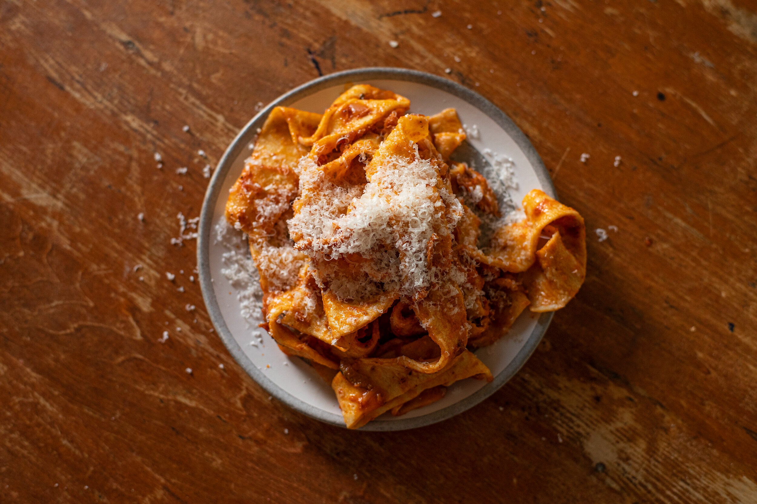 Chili garlic pappardelle with smashed broccoli and soft eggs.